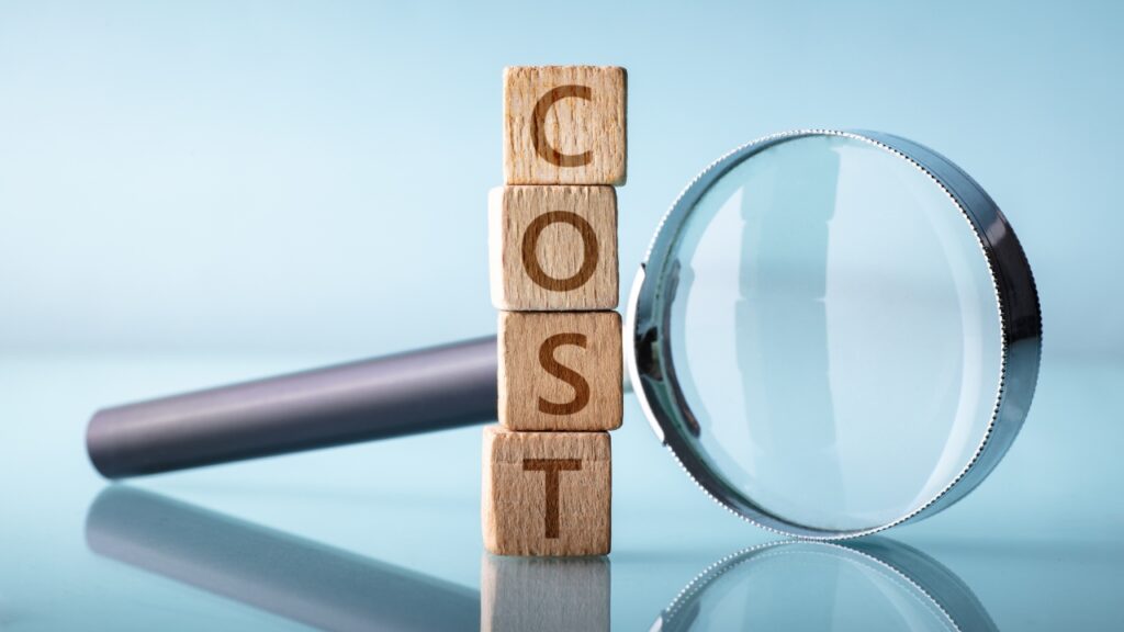 4 piles of wooden boxes with the words cost