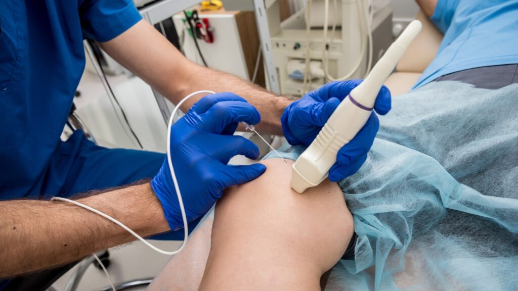 A doctor performing a radiofrequency ablation procedure for a patient